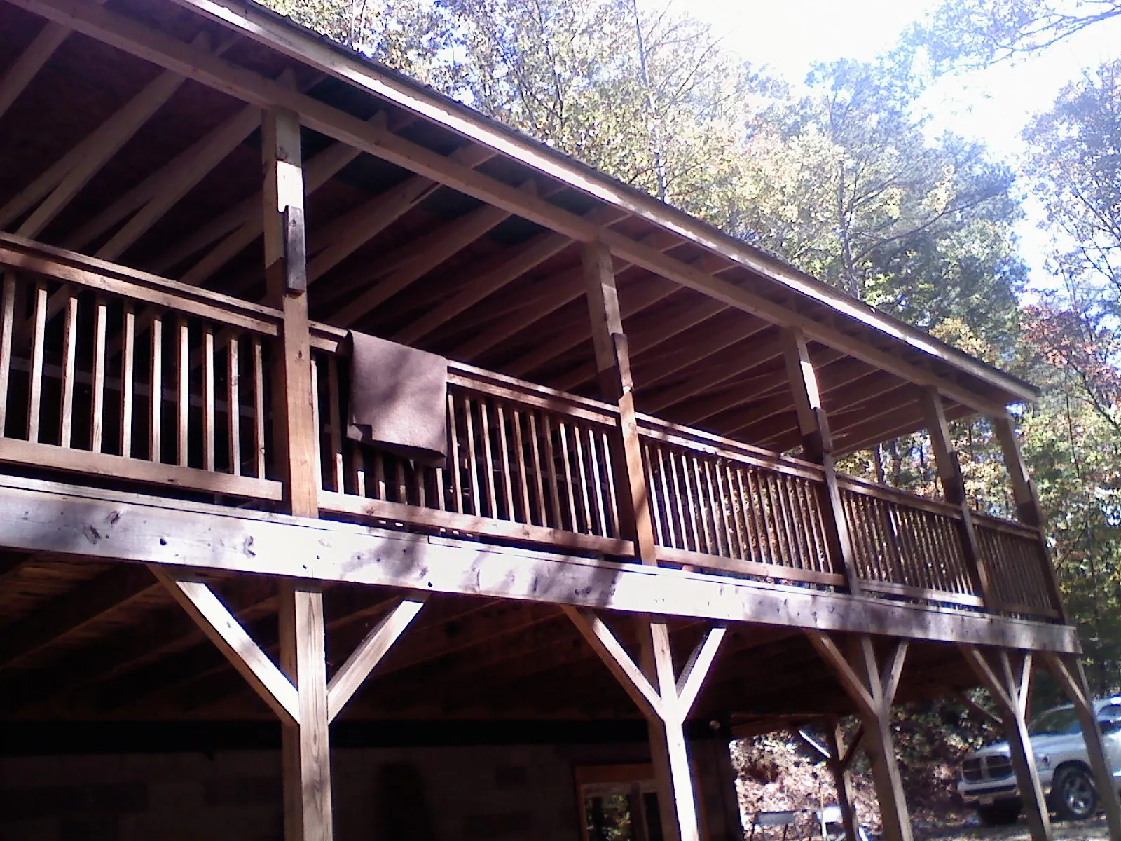 Timber framing under a new elevated porch and deck — Roof Leak Repair in Rifton by Roofing Brothers